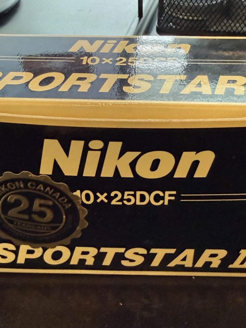Nikon Sportstar EX 10x25DCF binoculars in open box